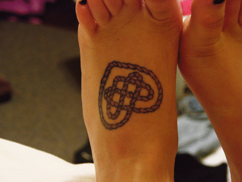 Girl's celtic friendship heart tattoo on foot