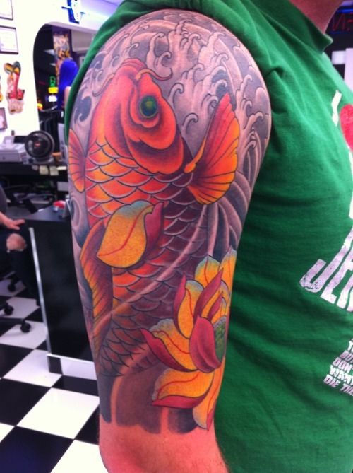 Half sleeve koi tattoo with fish for men