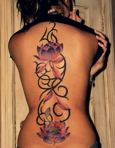 Girl back flower tribal tattoo
