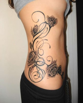 Red Rose Tattoo From Side To Thigh - Tattoo Ideas and Designs | Tattoos.ai