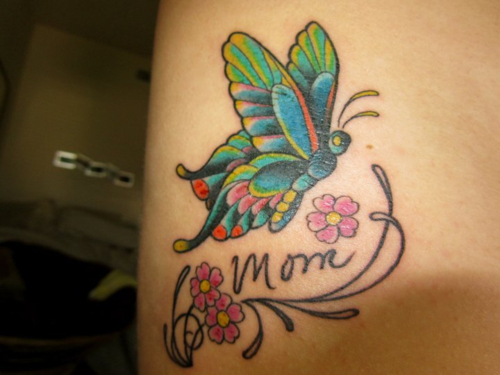 Beautiful Purple Ink Rose  Butterfly Memorial Tattoo With Word Mom On  Shoulder