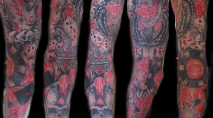Black and red full sleeve tattoo w. skulls and poker scene