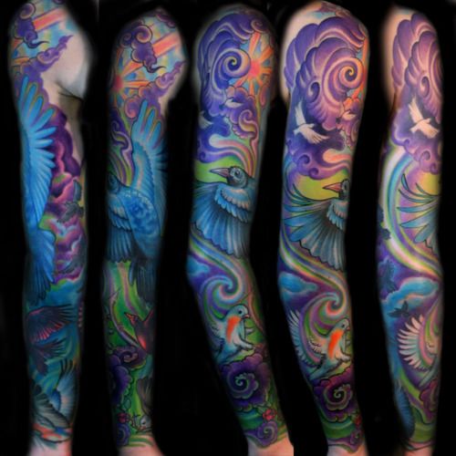 colorful full sleeve w. swirls, clouds, and birds