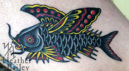 Crazy flying carp fish tattoo
