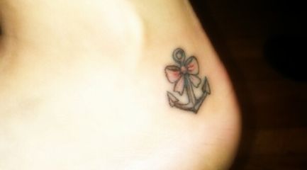 Cute ankle anchor tattoo with bow
