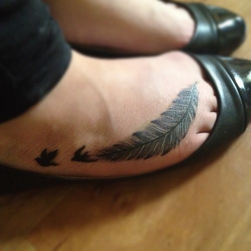 Feather and two birds tattoo on girls foot