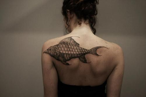 Girls back shoulder bird fish tattoo