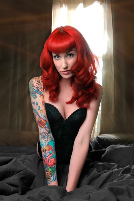 Girls full sleeve tattoo w. flamingos, ocean, and leopard print