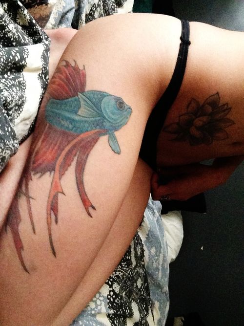 Large blue and red betta fish thigh tattoo