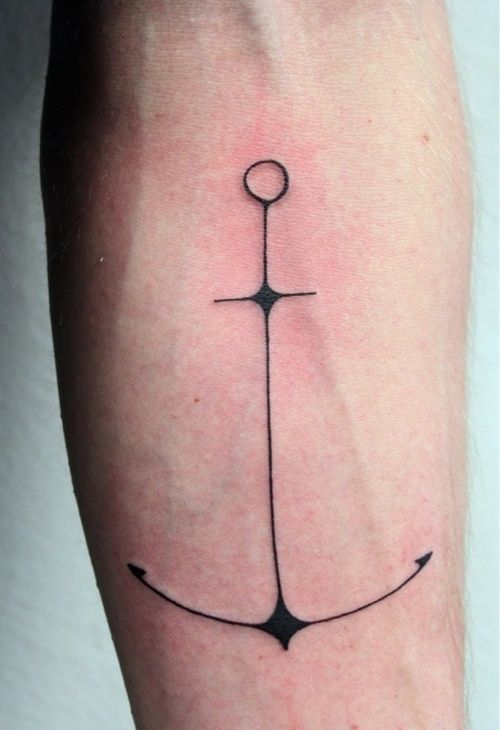 Long skinny black anchor tattoo on forearm
