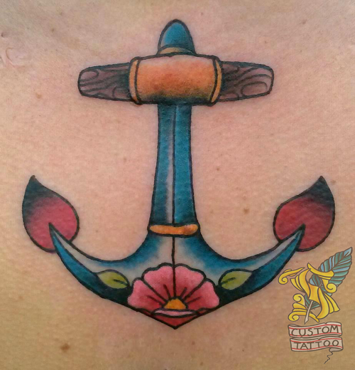 Old school colorful anchor tattoo with flower