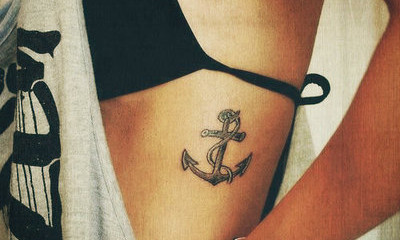 Sexy black anchor tattoo on girls side