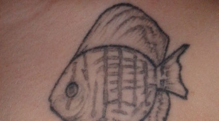Small black discus fish tattoo