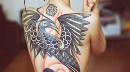 Amazing full back phoenix tattoo