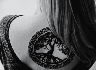 Awesome Celtic tree of life tattoo on girls back