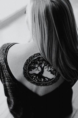 Awesome Celtic tree of life tattoo on girls back