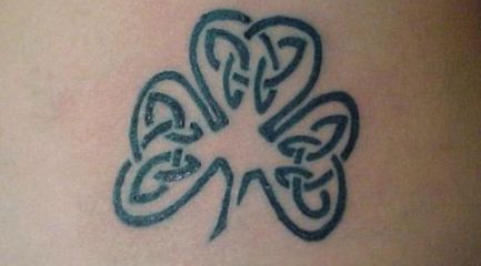 Celtic knots tattoo in the shape of a clover