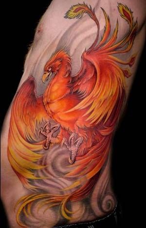 Detailed phoenix tattoo diving with talons on guys side