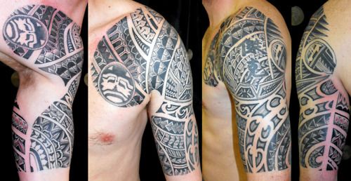 Guys Polynesian chest and half sleeve tattoo