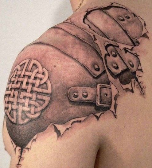 Intense shoulder armor tattoo with Celtic cross