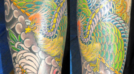 Japanese phoenix in guys sleeve tattoo
