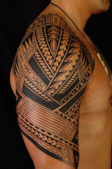 Polynesian half sleeve arm tattoo