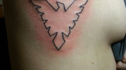 Triangle phoenix outline tattoo